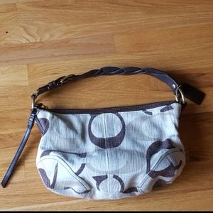 Authentic COACH over the shoulder purse. Has official coach leather tag inside.